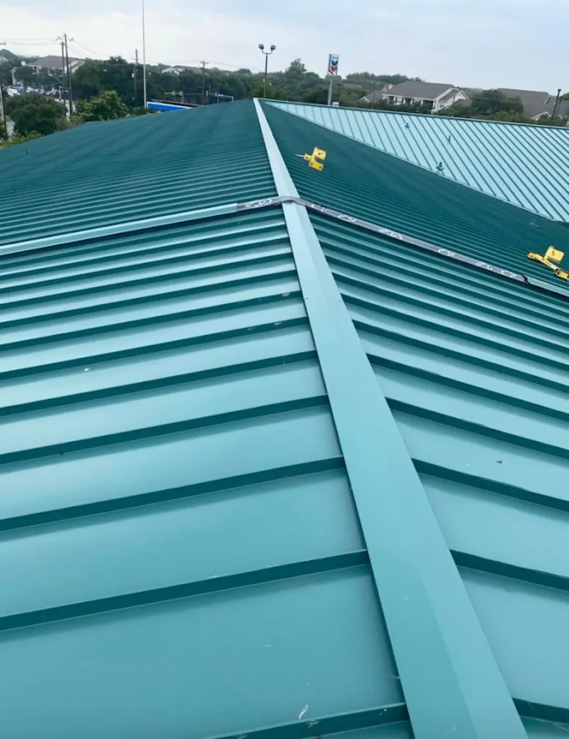 Green commercial metal roof ridge and valley for Metal Roof Repair in Tellico Village