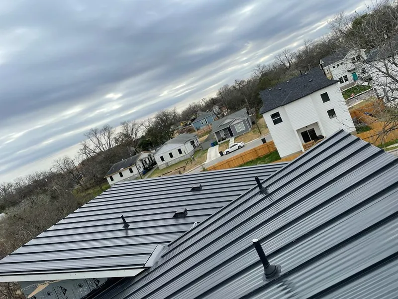 Standing seam metal roof panels with vents for Skylight Repair in Tellico Village